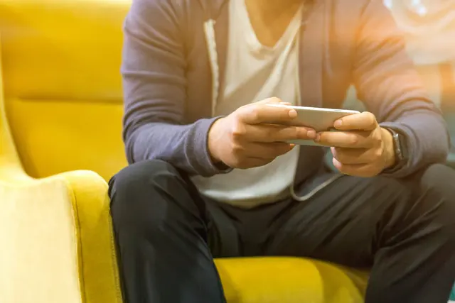 Patient on a video call with a provider using a smartphone